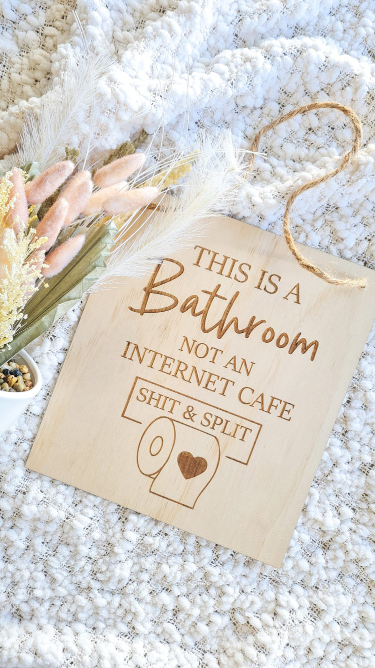 This is a bathroom… plaque