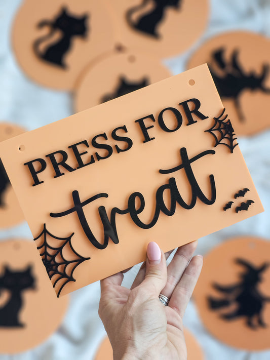 Press for treat sign