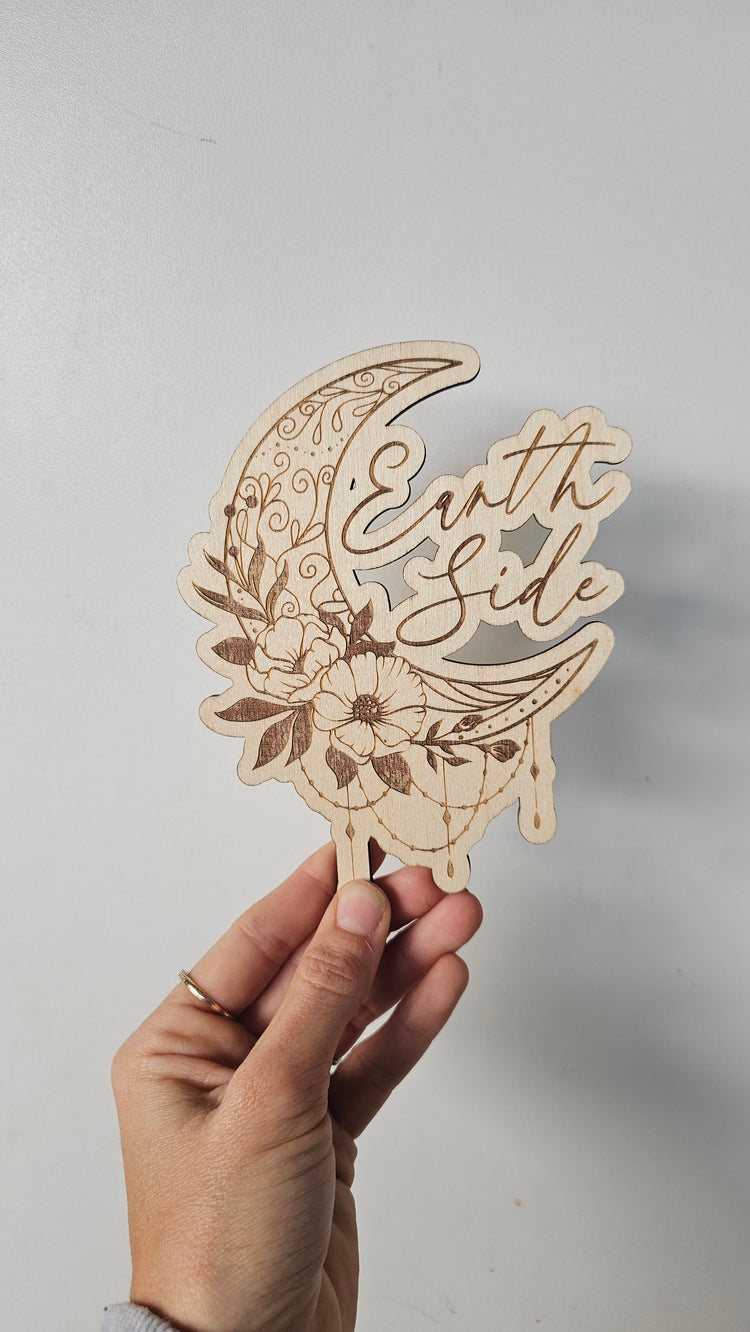 Earth side plaque