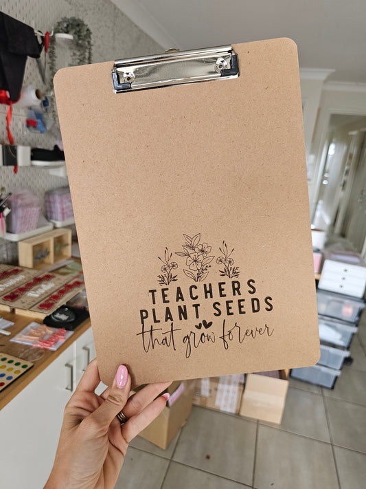 Teachers plant seeds clipboard